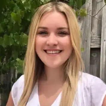 Happy customer sharing her positive experience with AquaBurn