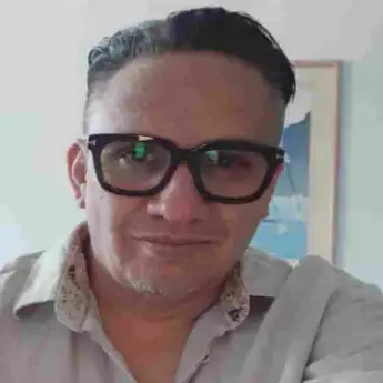 Satisfied customer smiling after sharing his experience